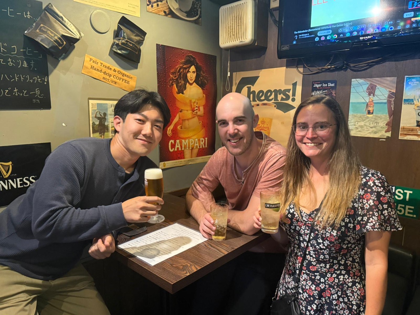 Guests with local guide Yuki enjoying drinks at a local Ofuna bar